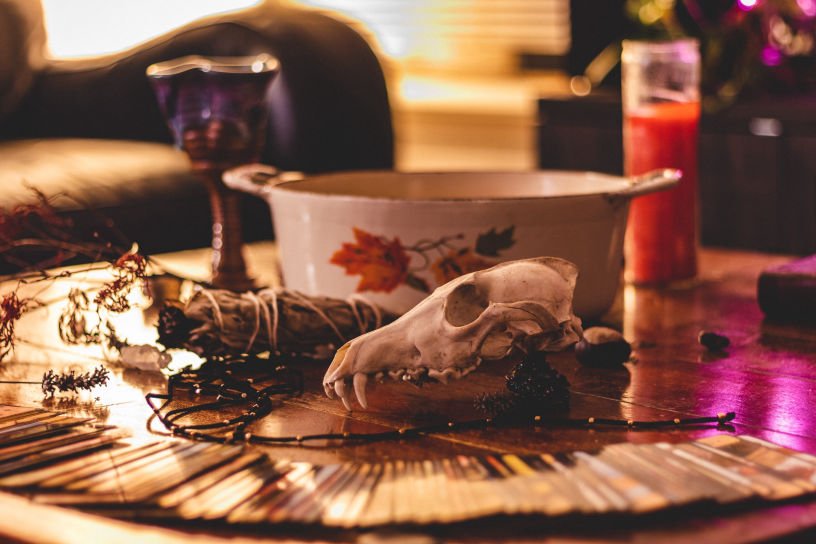 A Witch gathers the materials needed for a love spell.